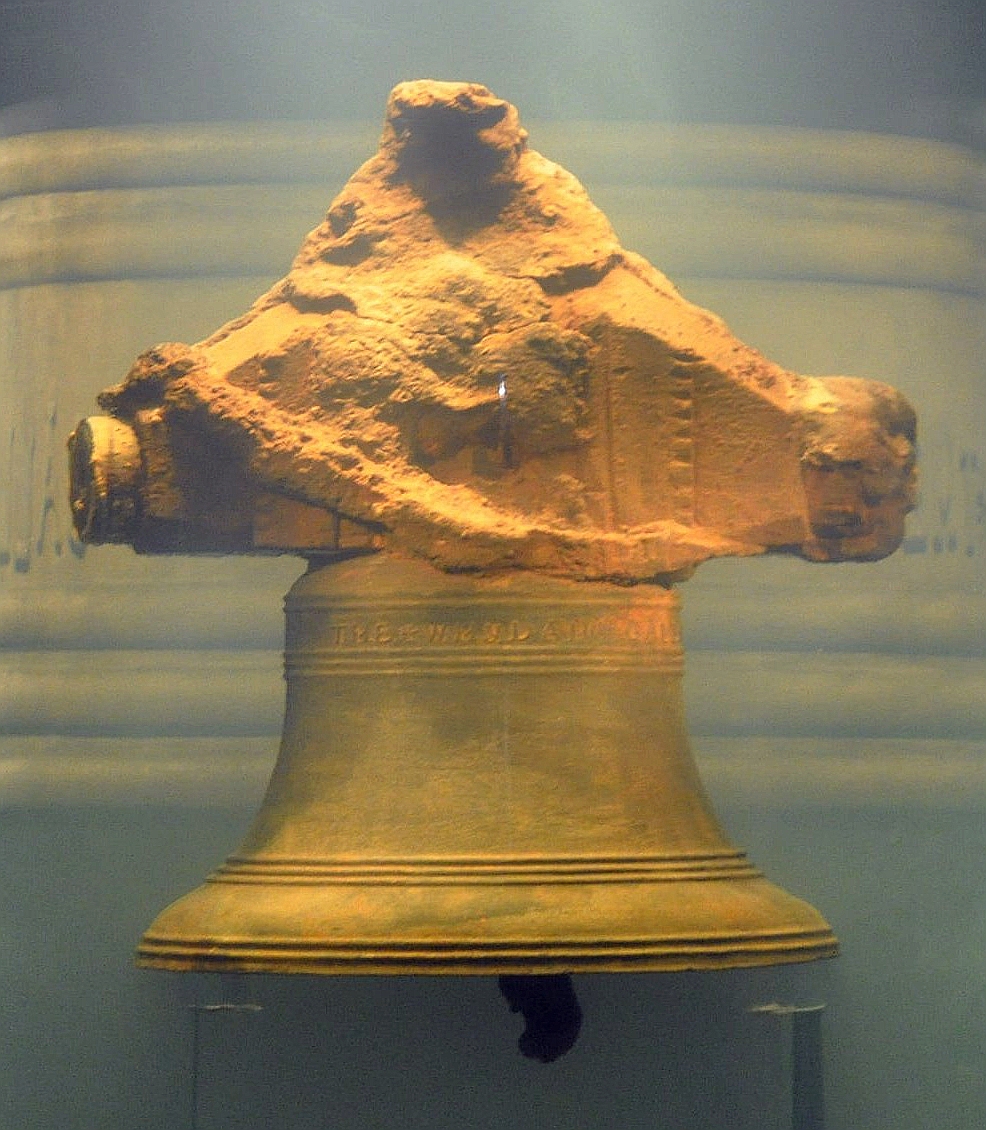 Encrusted bronze ship's bell recovered from the Whydah wreck, inscribed THE WHYDAH GALLY 1716.